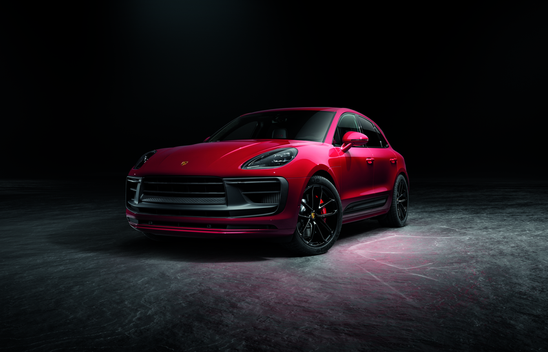 Shot of Red Porsche Macan showing the front and side 